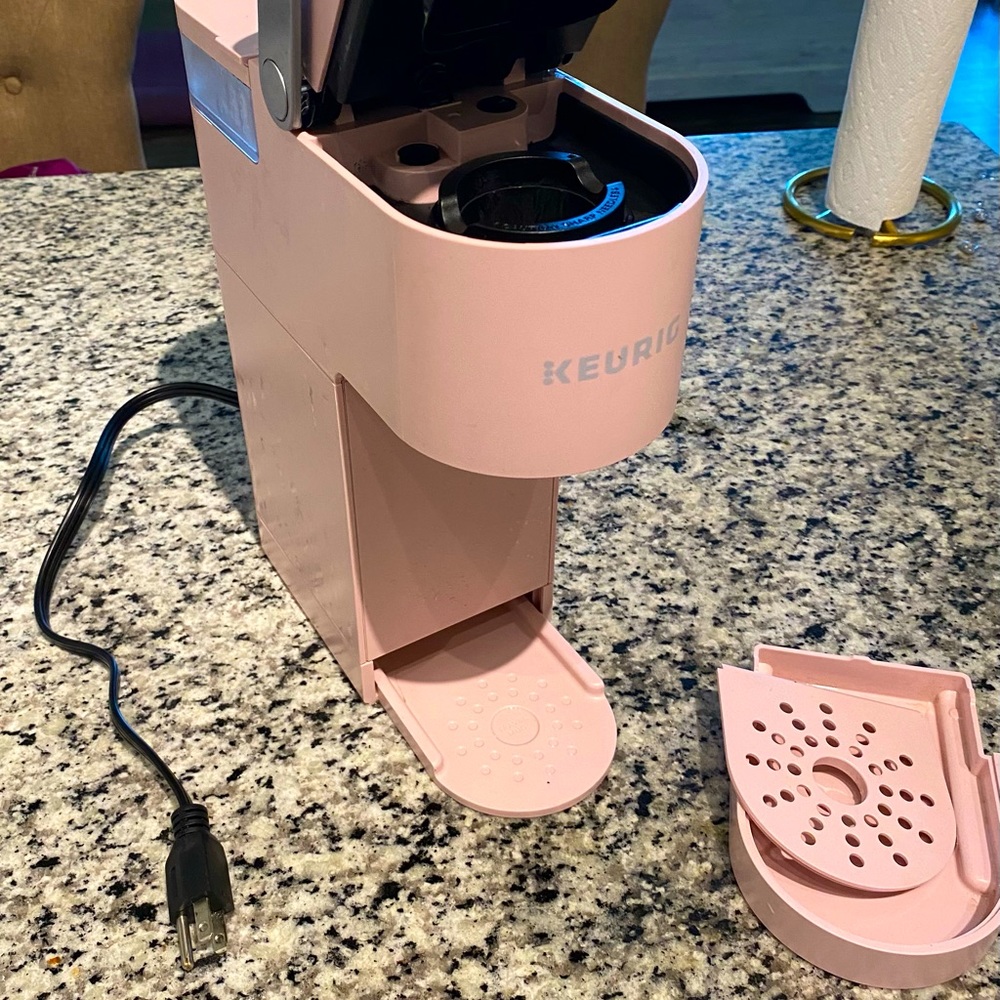Pink Keurig coffee maker.
